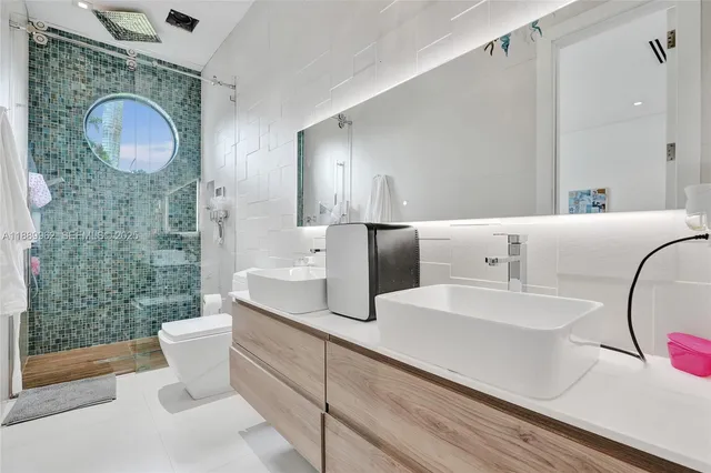 a bedroom with a bed and a table in it