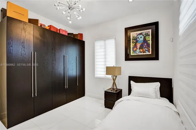 a room with a wooden floor and furniture