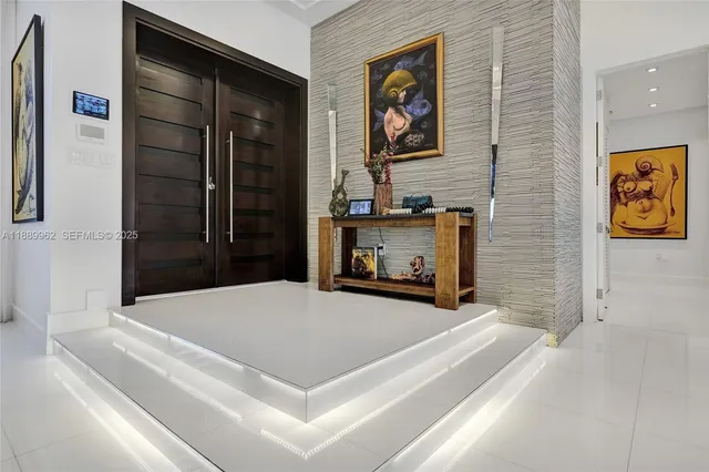 a white refrigerator freezer sitting in a kitchen