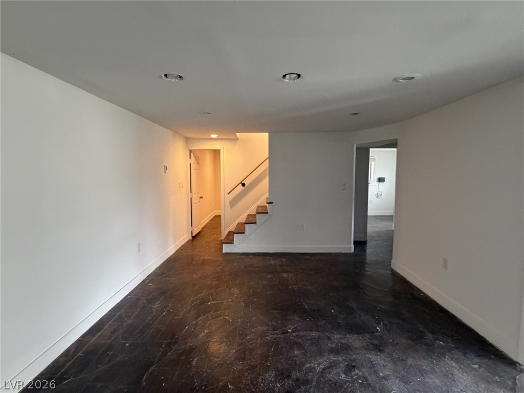 1 Carson Court Ely, NV 89301 - Photo 14 of 20 Down stairs-This versatile open-concept space awaits your personal touch to create an ideal living area.