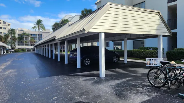 a view of a house with porch and furniture