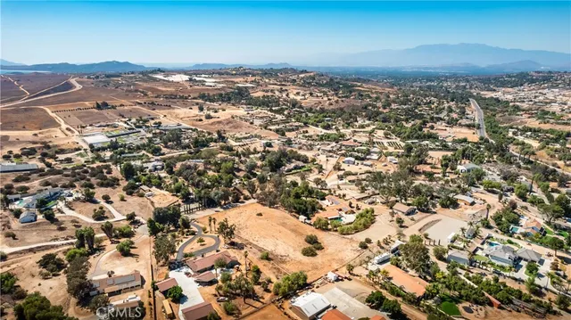 an aerial view of residential house with outdoor space
