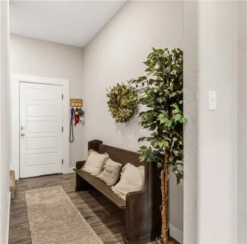 a entryway with flower plants