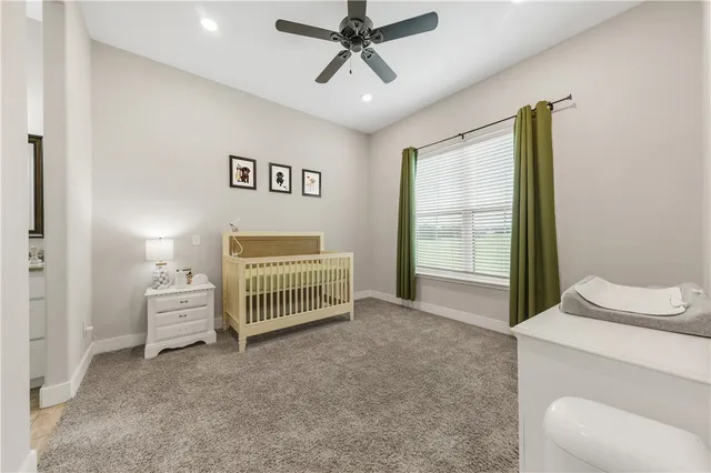 a bathroom with a granite countertop sink mirror and a