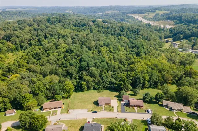 a view of a back yard of the house