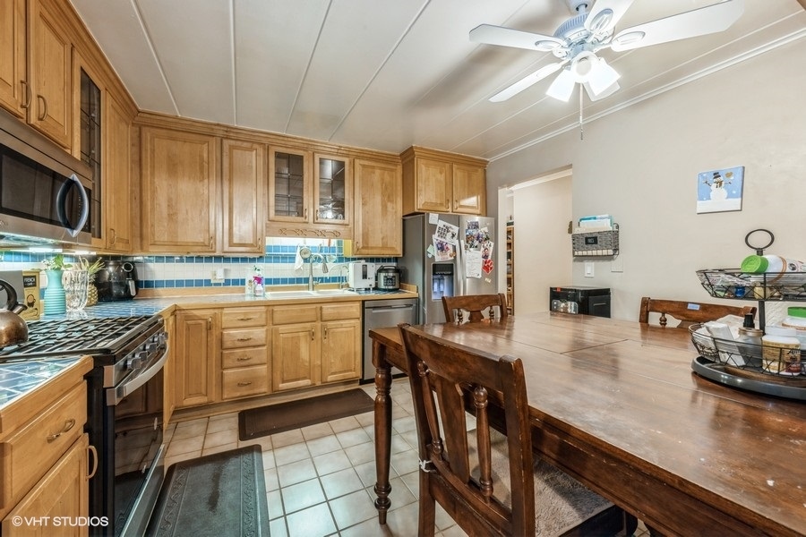 1001 Deerfield Road, Unit 204 Deerfield, IL 60015 - Photo 13 of 20 a kitchen with counter top space cabinets and appliances