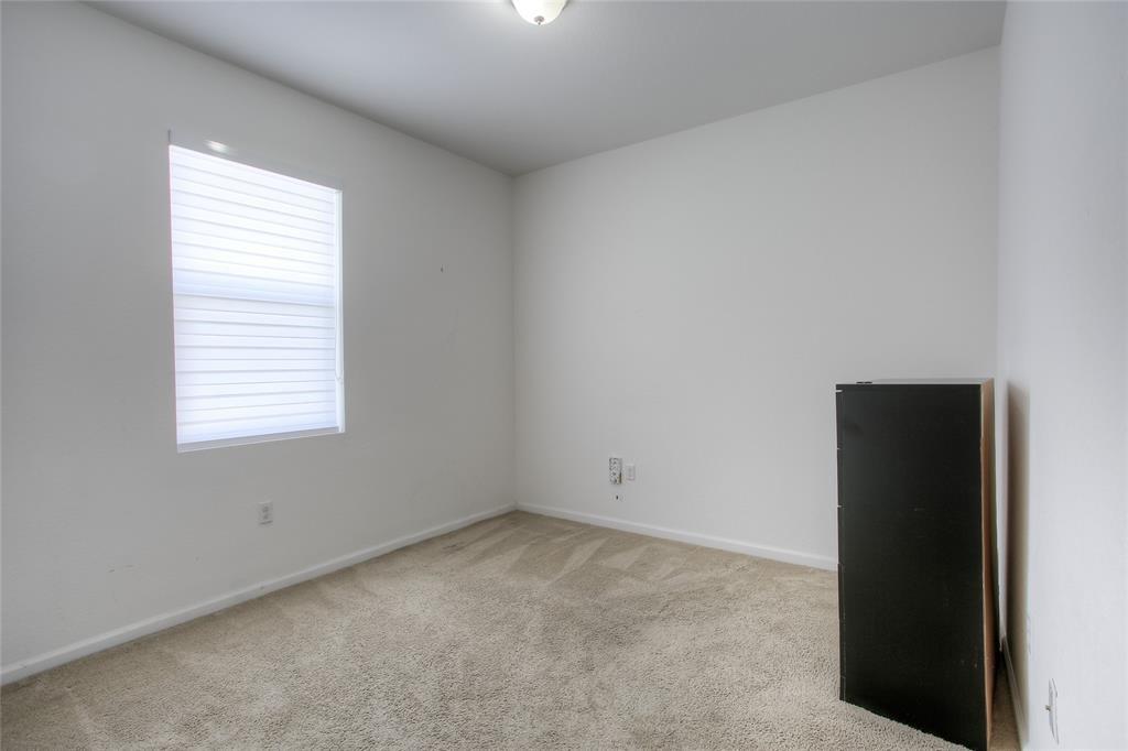 27775 Southwest 133rd Path Homestead, FL 33032 - Photo 2 of 16 an empty room with a window