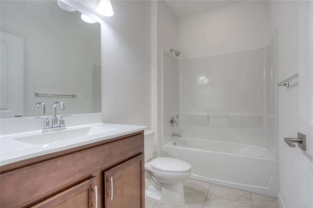 27775 Southwest 133rd Path Homestead, FL 33032 - Photo 3 of 16 a bathroom with a sink a toilet and shower