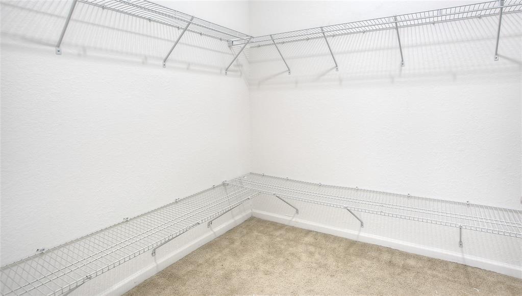 27775 Southwest 133rd Path Homestead, FL 33032 - Photo 10 of 16 a view of a room with racks on the wall