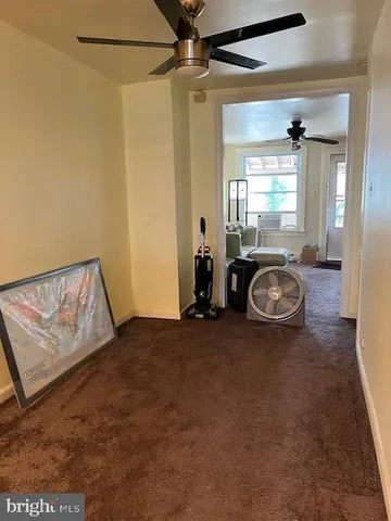 a view of a livingroom with furniture