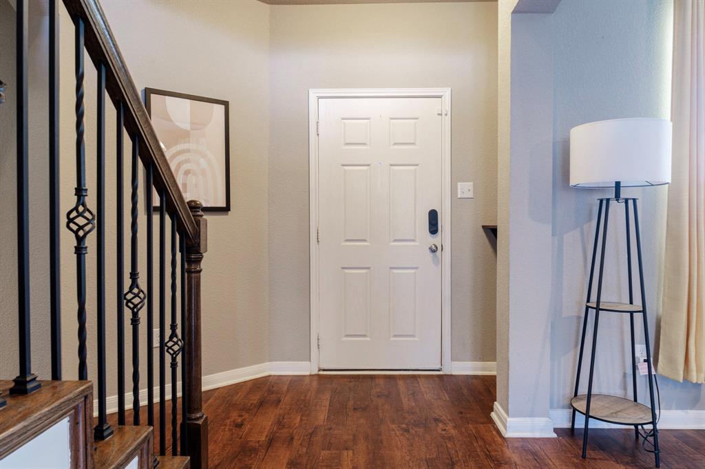 2716 Beutel Road Lorena, TX 76655 - Photo 23 of 39 a view of front door with wooden floor