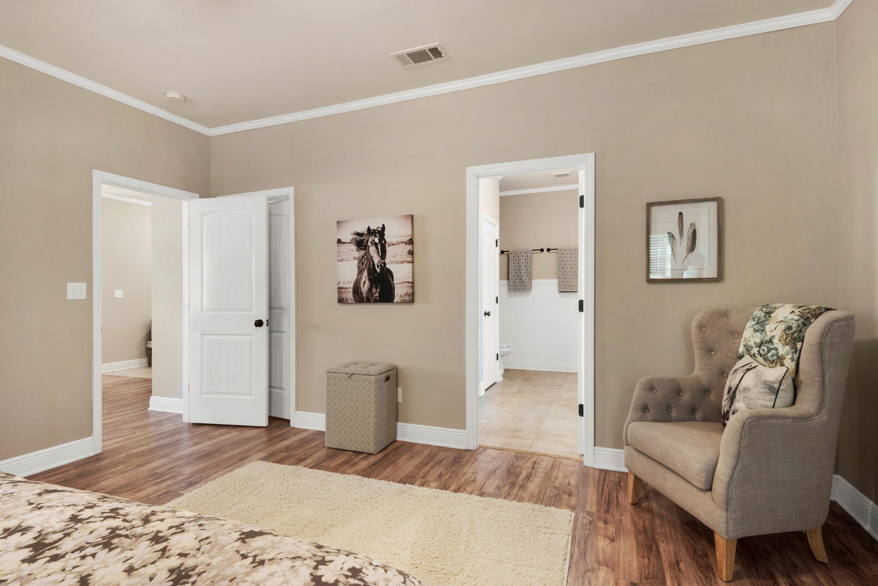 6031 Hidden Valley Road Crestview, FL 32539 - Photo 22 of 41 a spacious bedroom with a couch and a couch