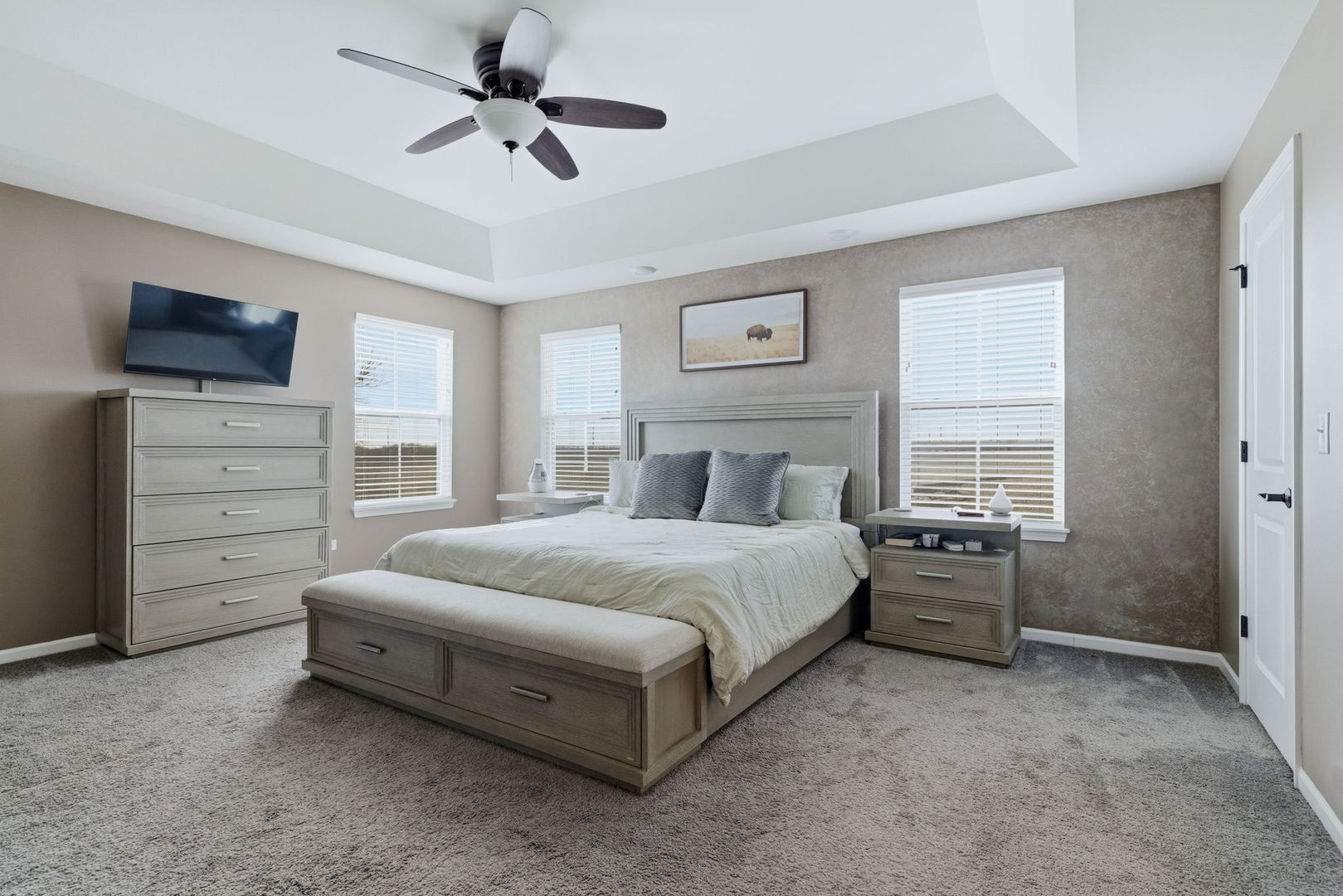 16436 Wheatgrass Street Lockport, IL 60441 - Photo 11 of 23 a spacious bedroom with a bed and a ceiling fan