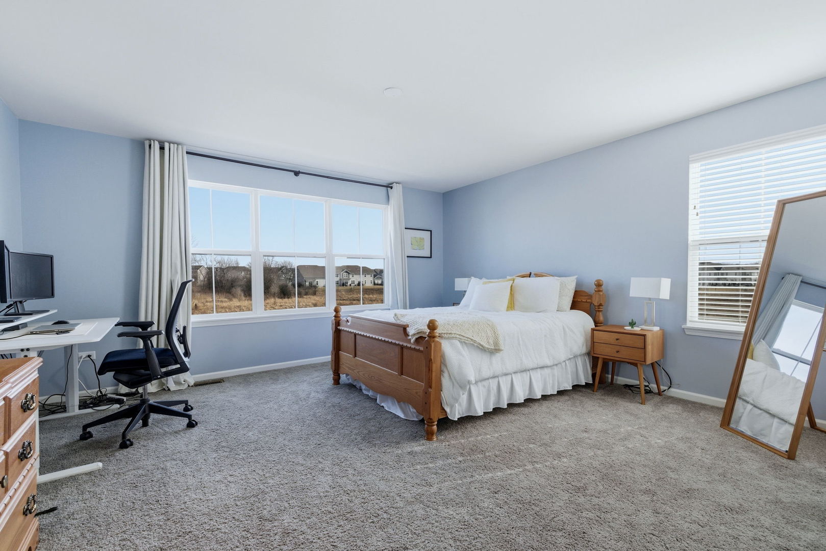 16436 Wheatgrass Street Lockport, IL 60441 - Photo 14 of 23 a bedroom with furniture and a large window