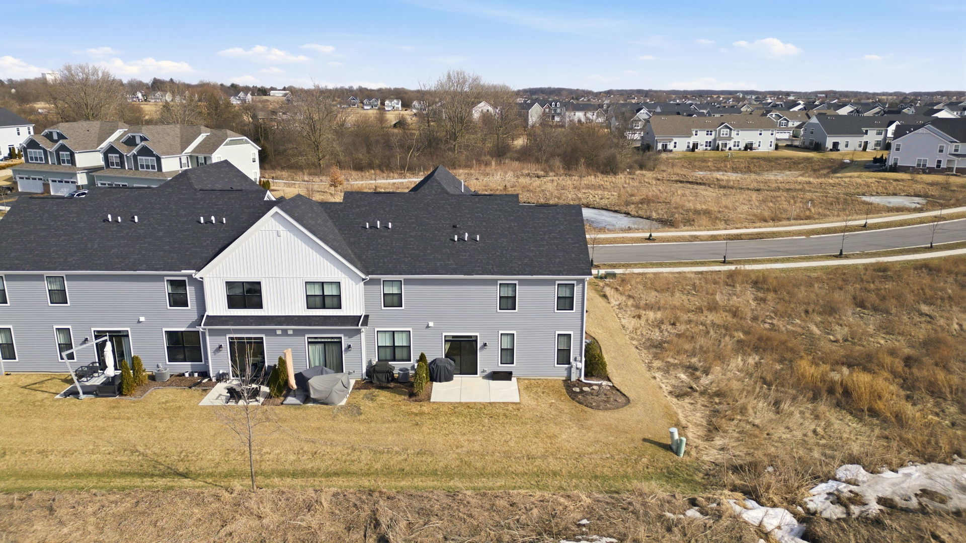 16436 Wheatgrass Street Lockport, IL 60441 - Photo 22 of 23 an aerial view of residential houses with outdoor space and seating
