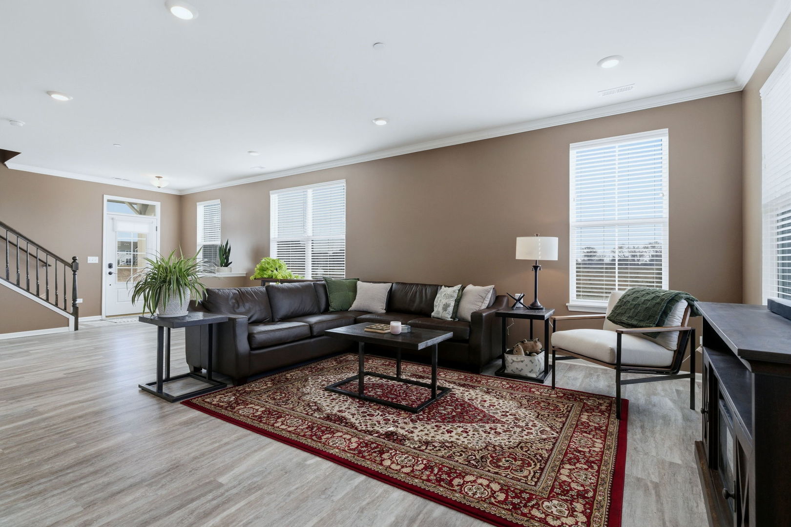 16436 Wheatgrass Street Lockport, IL 60441 - Photo 3 of 23 a living room with furniture and a rug