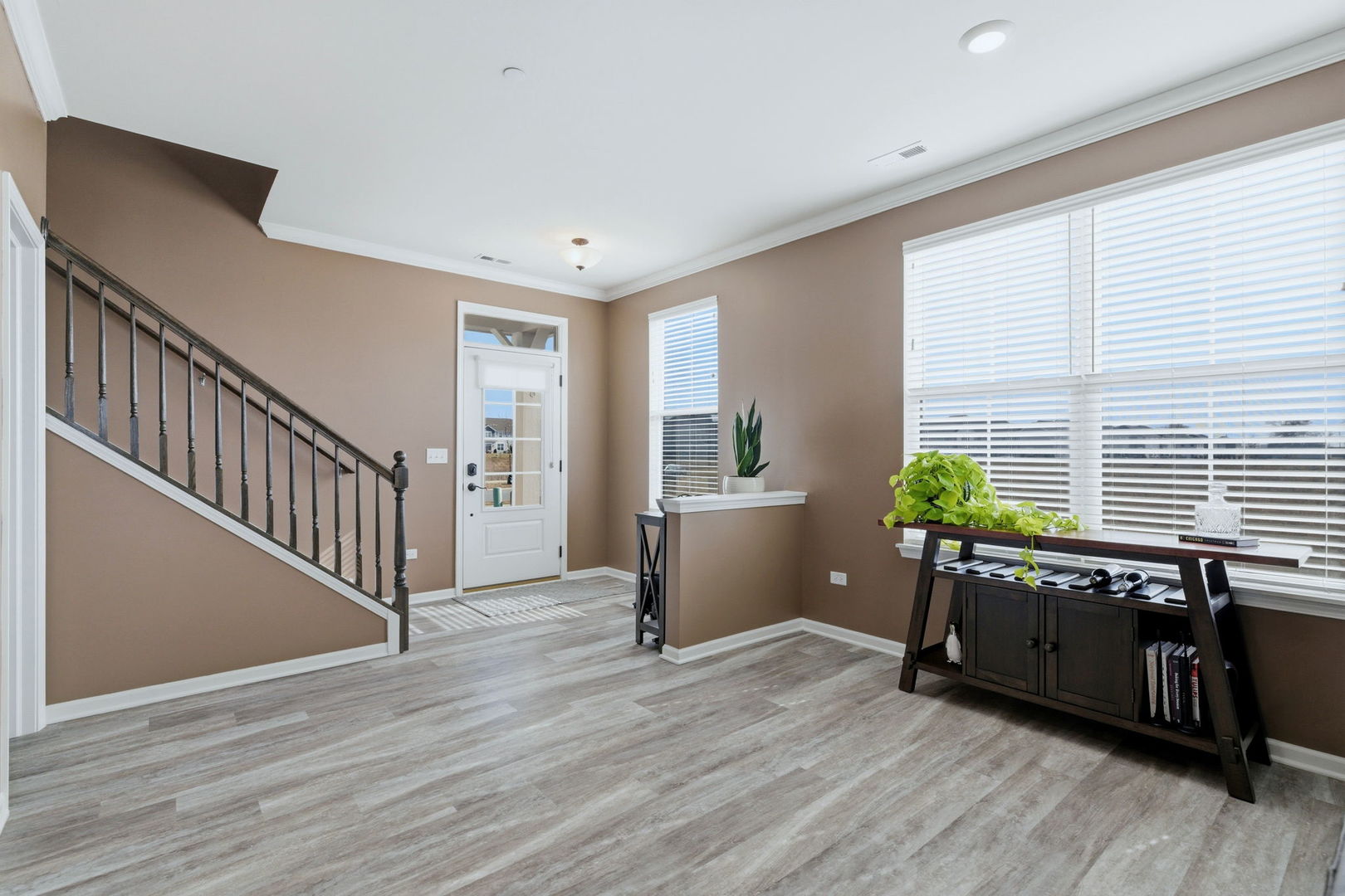 16436 Wheatgrass Street Lockport, IL 60441 - Photo 5 of 23 a view of a livingroom with furniture window and wooden floor