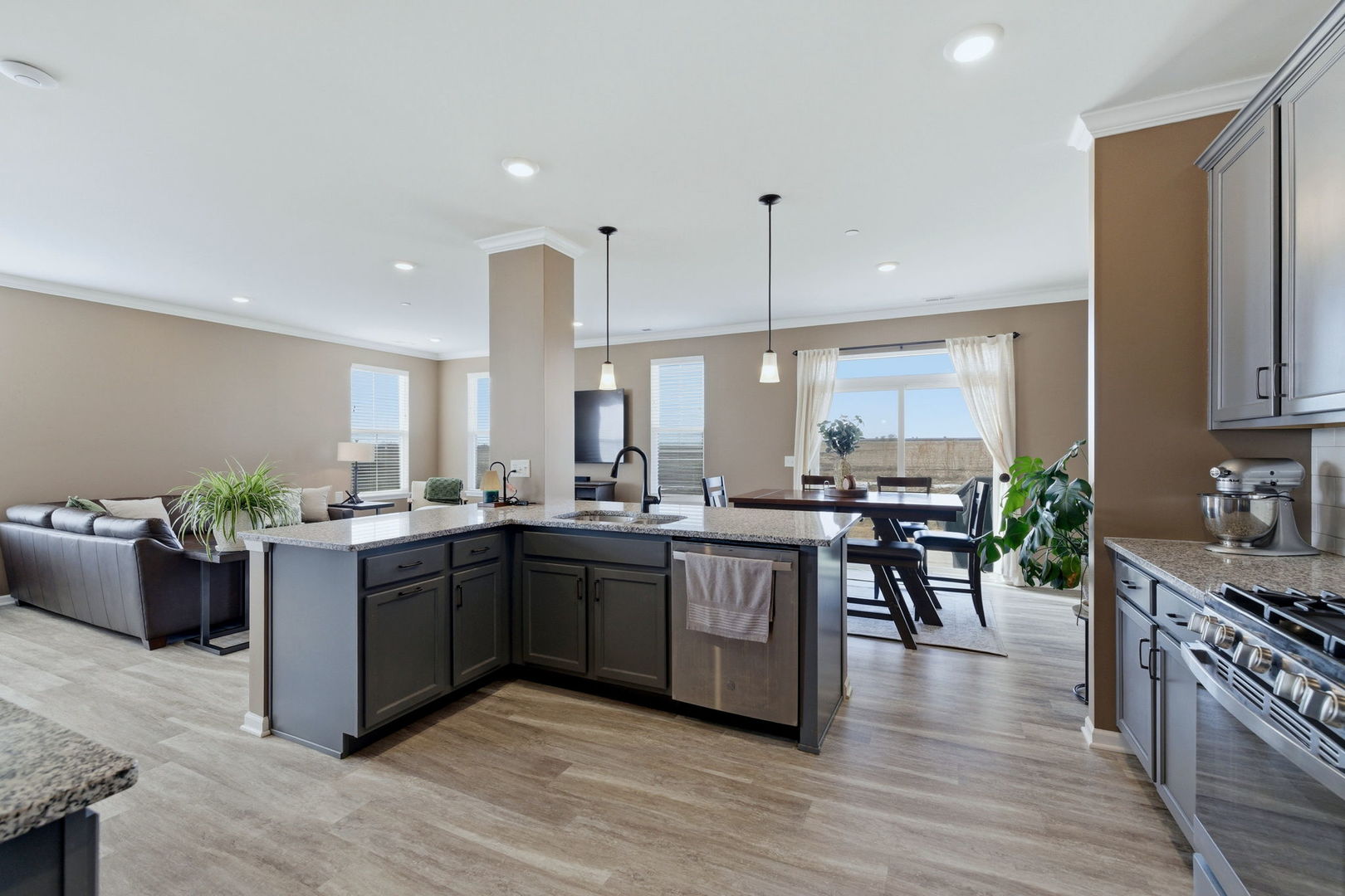 16436 Wheatgrass Street Lockport, IL 60441 - Photo 7 of 23 a kitchen with lots of counter top space and furniture