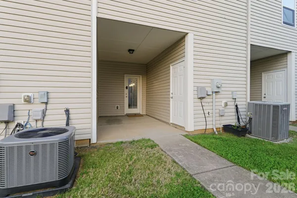 a view of a house with a sink and a yard