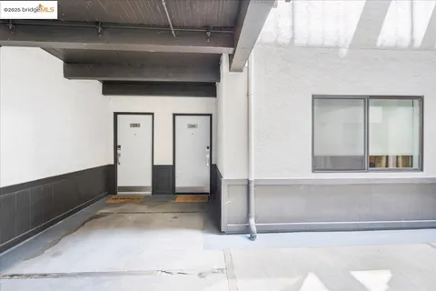 a bathroom with a toilet and a shower curtain