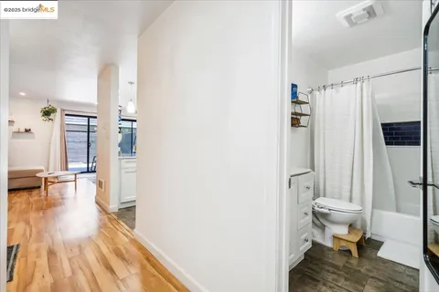 a bathroom with a toilet a sink and a shower