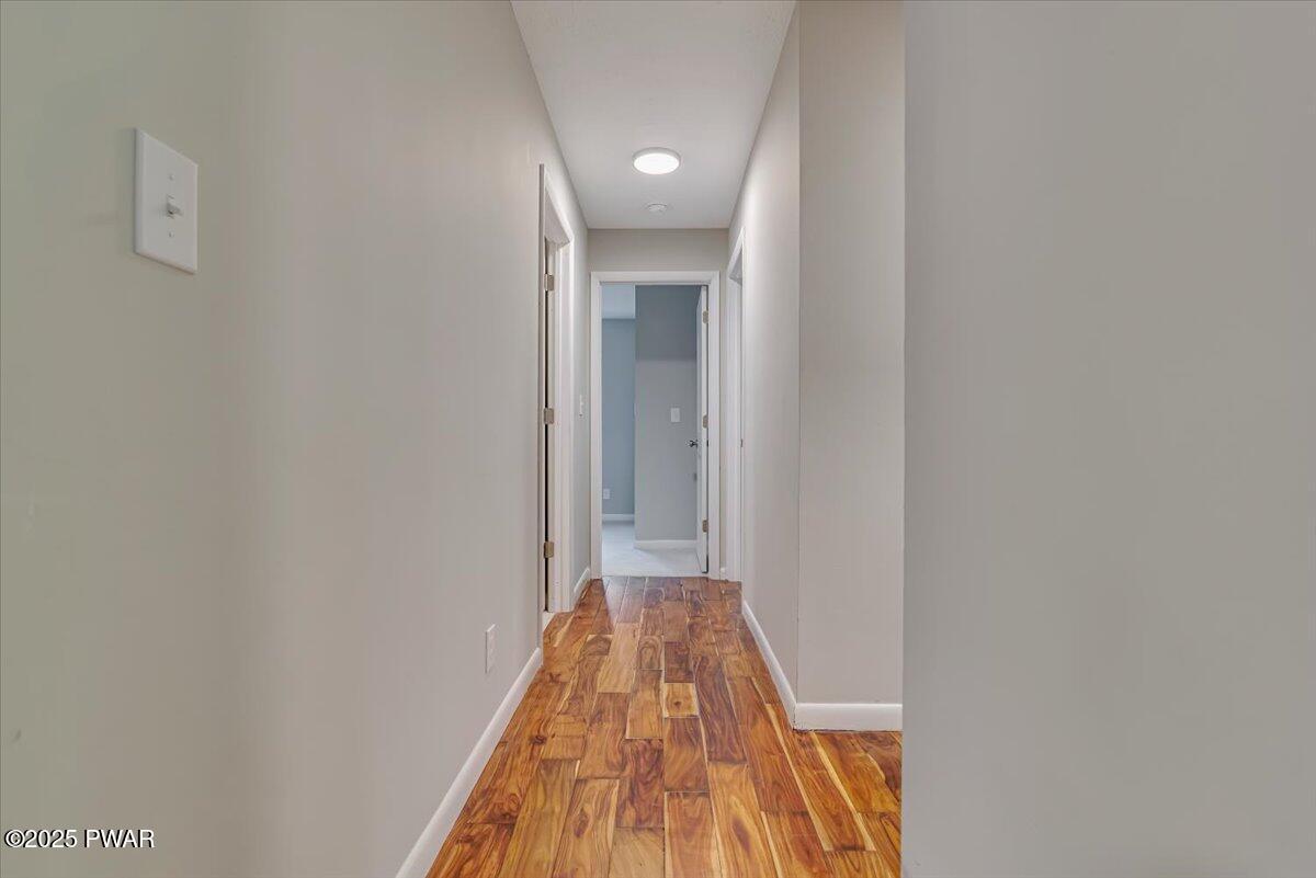 107 Kiel Road Milford, PA 18337 - Photo 25 of 71 a view of a hallway with wooden floor