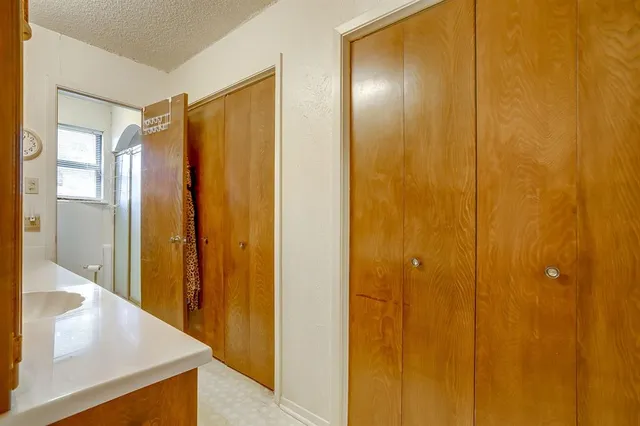 a bathroom with a shower and a tub