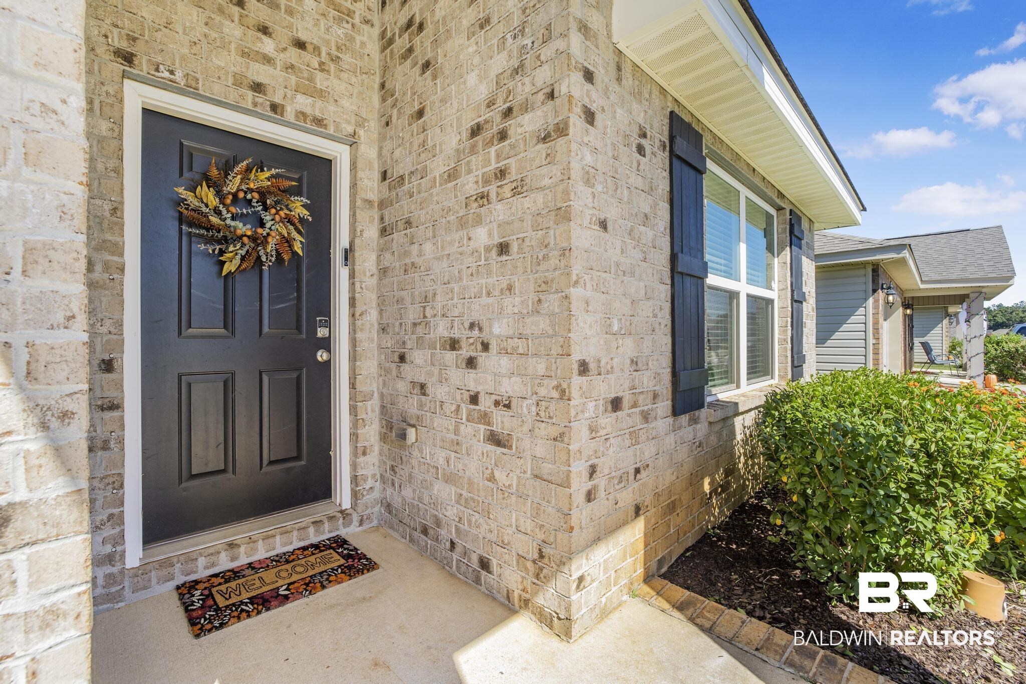 10738 Ridgeview Drive Mobile, AL 36608 - Photo 31 of 48 Property entrance with brick siding