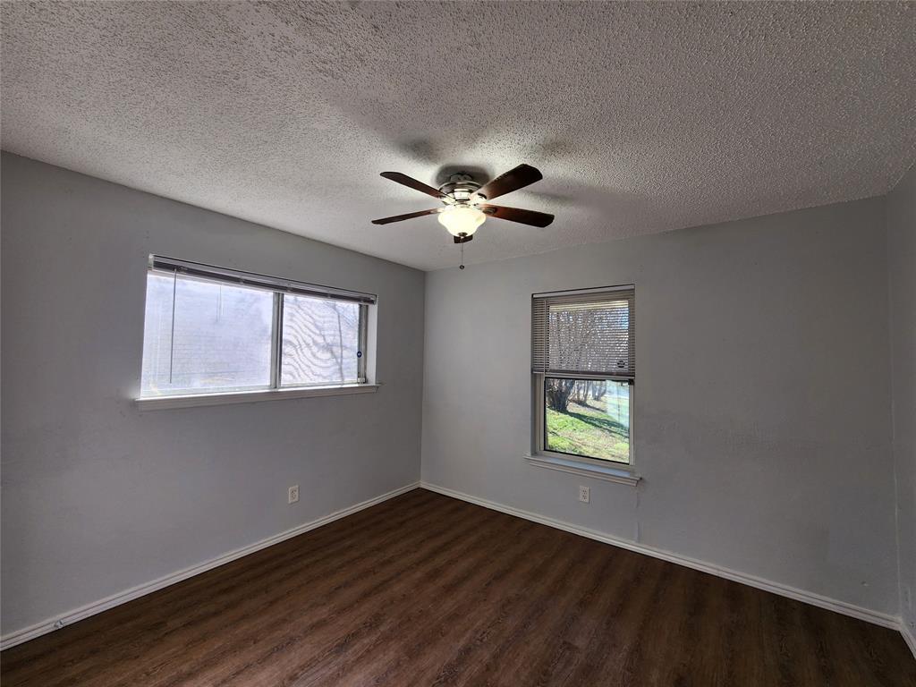 803 10th Street Princeton, TX 75407 - Photo 6 of 12 a view of an empty room with a window