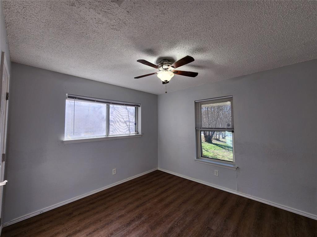 803 10th Street Princeton, TX 75407 - Photo 7 of 12 a view of an empty room with a window