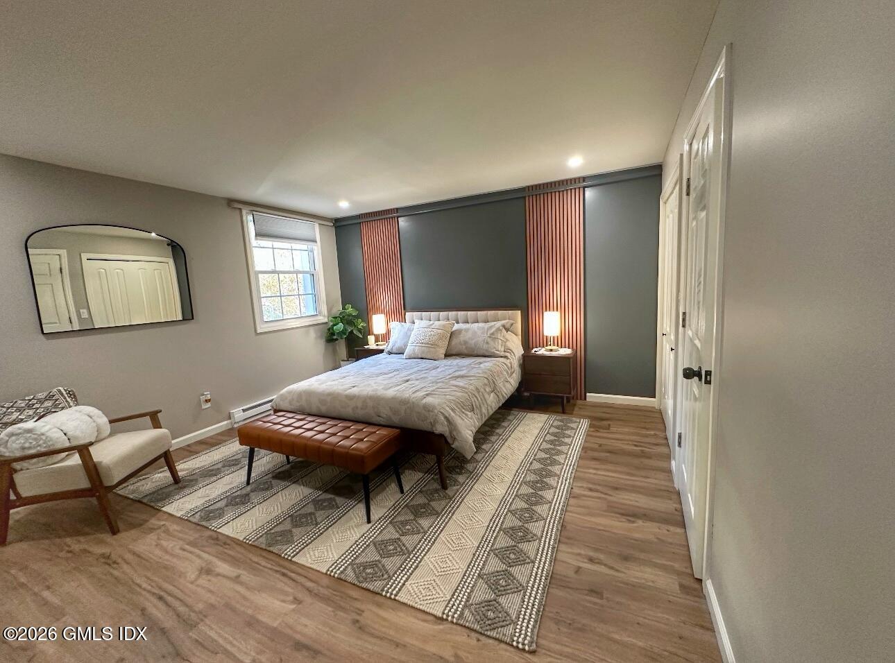 37 Gerry Street Greenwich, CT 06830 - Photo 12 of 14 a bedroom with a bed and window