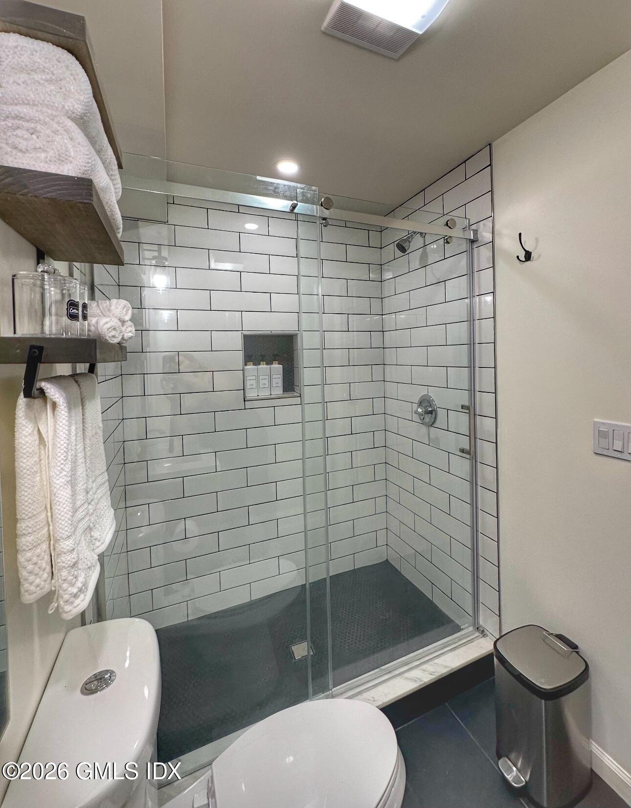 37 Gerry Street Greenwich, CT 06830 - Photo 14 of 14 a bathroom with a toilet and a shower