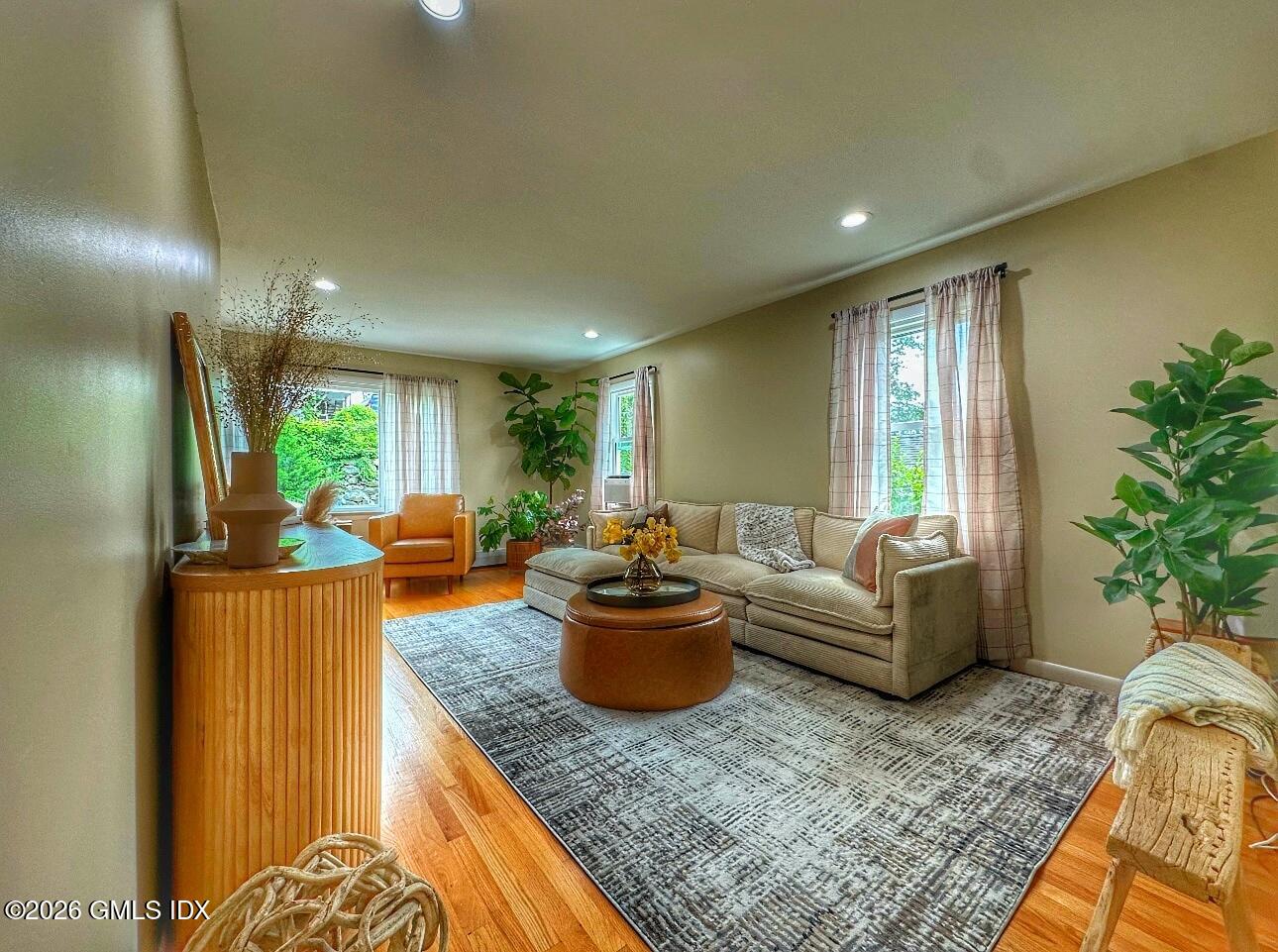 37 Gerry Street Greenwich, CT 06830 - Photo 2 of 14 a living room with furniture and a large window