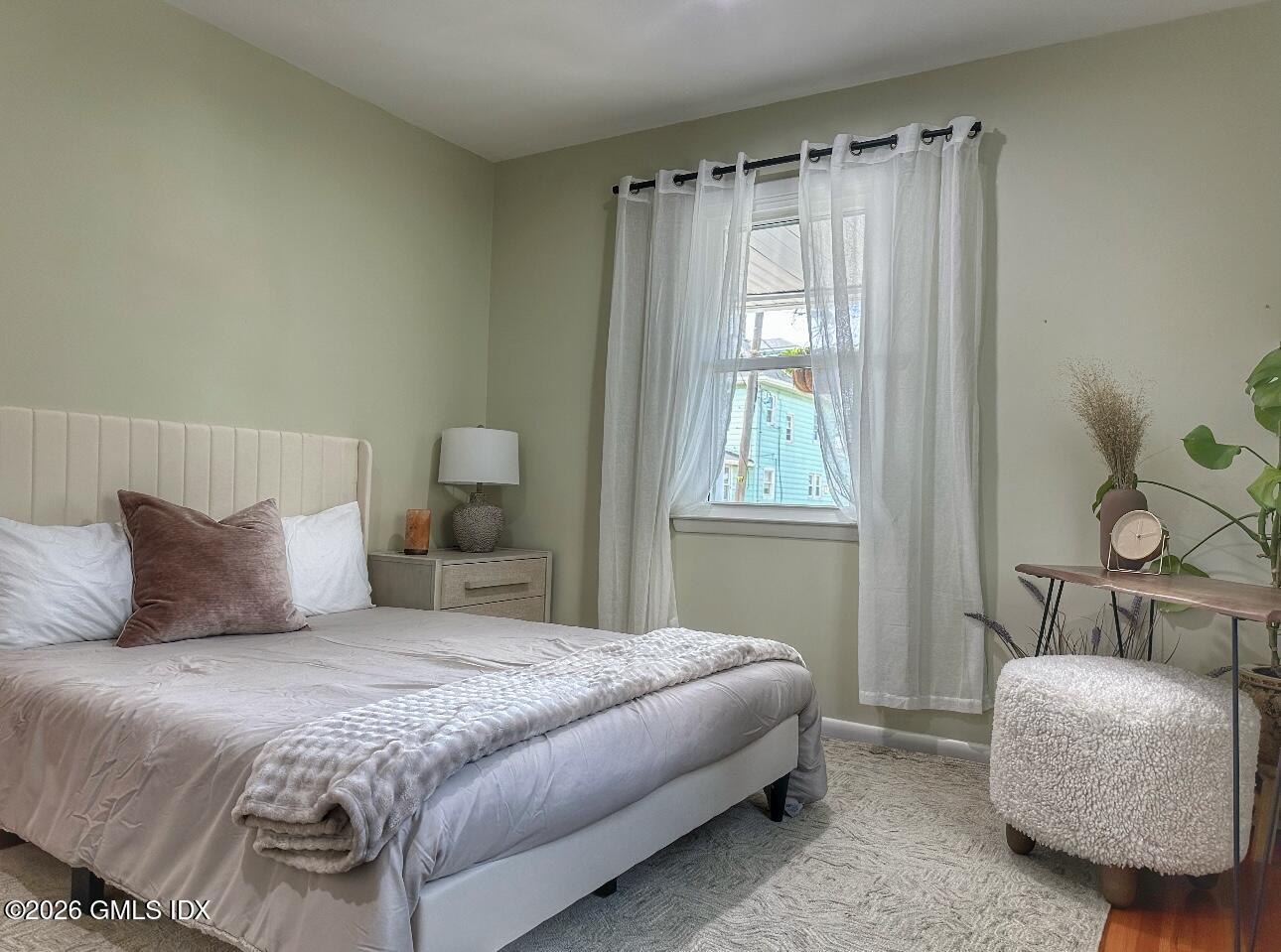 37 Gerry Street Greenwich, CT 06830 - Photo 6 of 14 a bedroom with a bed and window