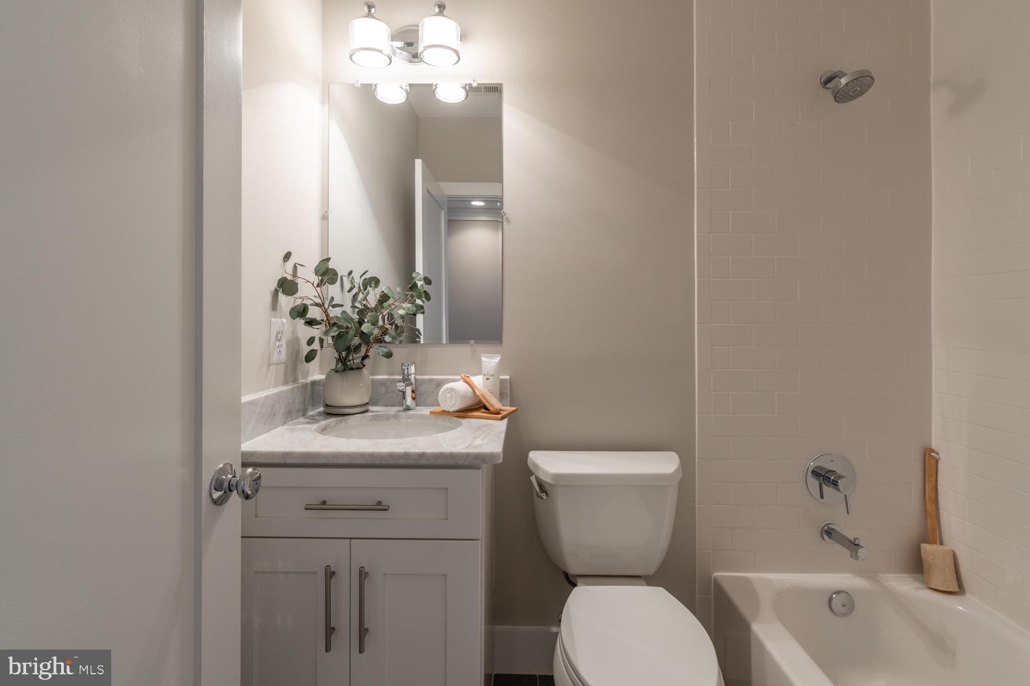 4110 3rd Street Northwest Washington, DC 20011 - Photo 27 of 47 Elegant Hall Bath w Marble Vanity & Subway Tile