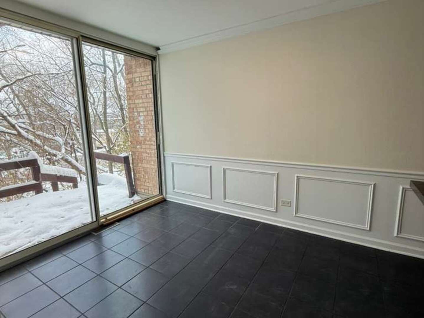 5900 Forest View Road, Unit 1A Lisle, IL 60532 - Photo 4 of 12 a view of an empty room with a window