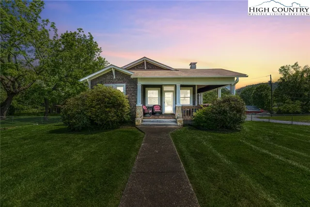 a front view of a house with yard