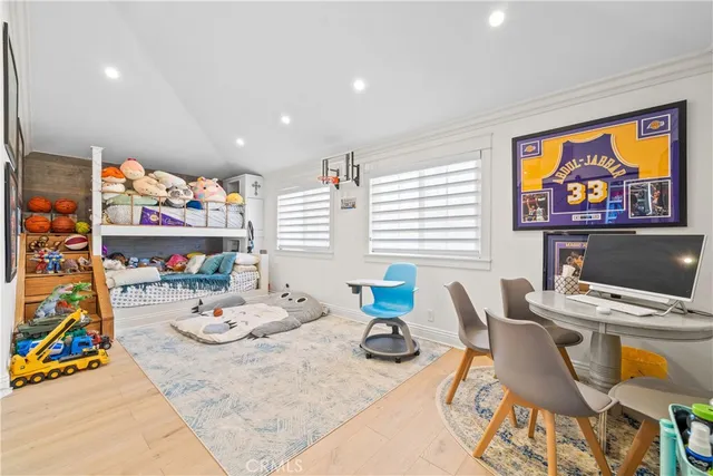 a bedroom with furniture and a bed