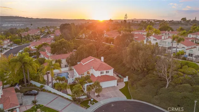 a street sign on a pole next to a building