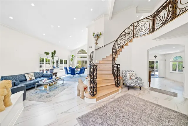 a view of entryway livingroom and hall