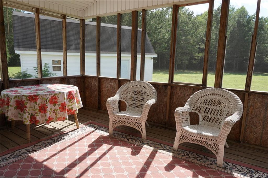 2390 Gill Jordan Road Chester, SC 29706 - Photo 31 of 44 a balcony with furniture and a garden