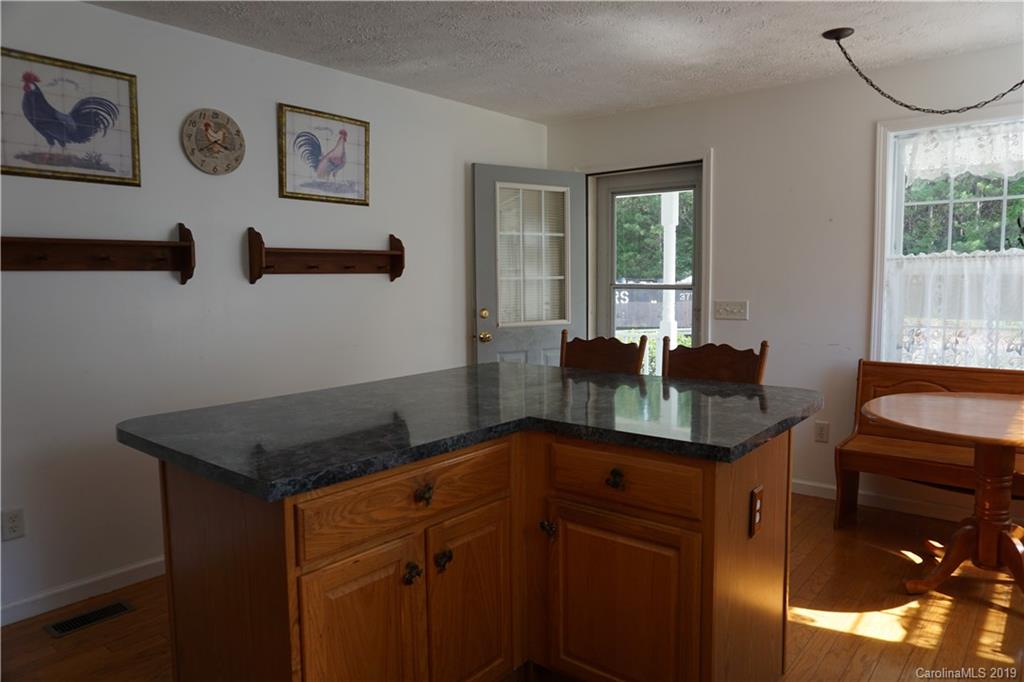 2390 Gill Jordan Road Chester, SC 29706 - Photo 9 of 44 a room that has a bed and a table in it