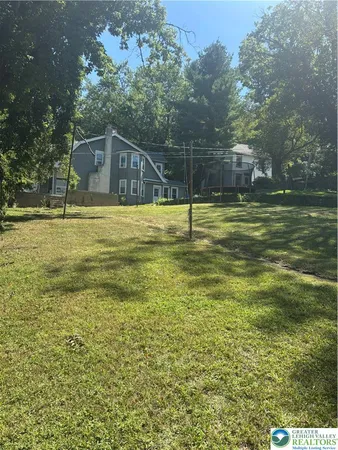 a view of a house with a swimming pool