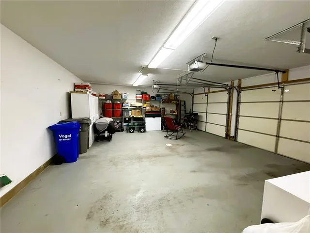 a front view of a house with outdoor seating