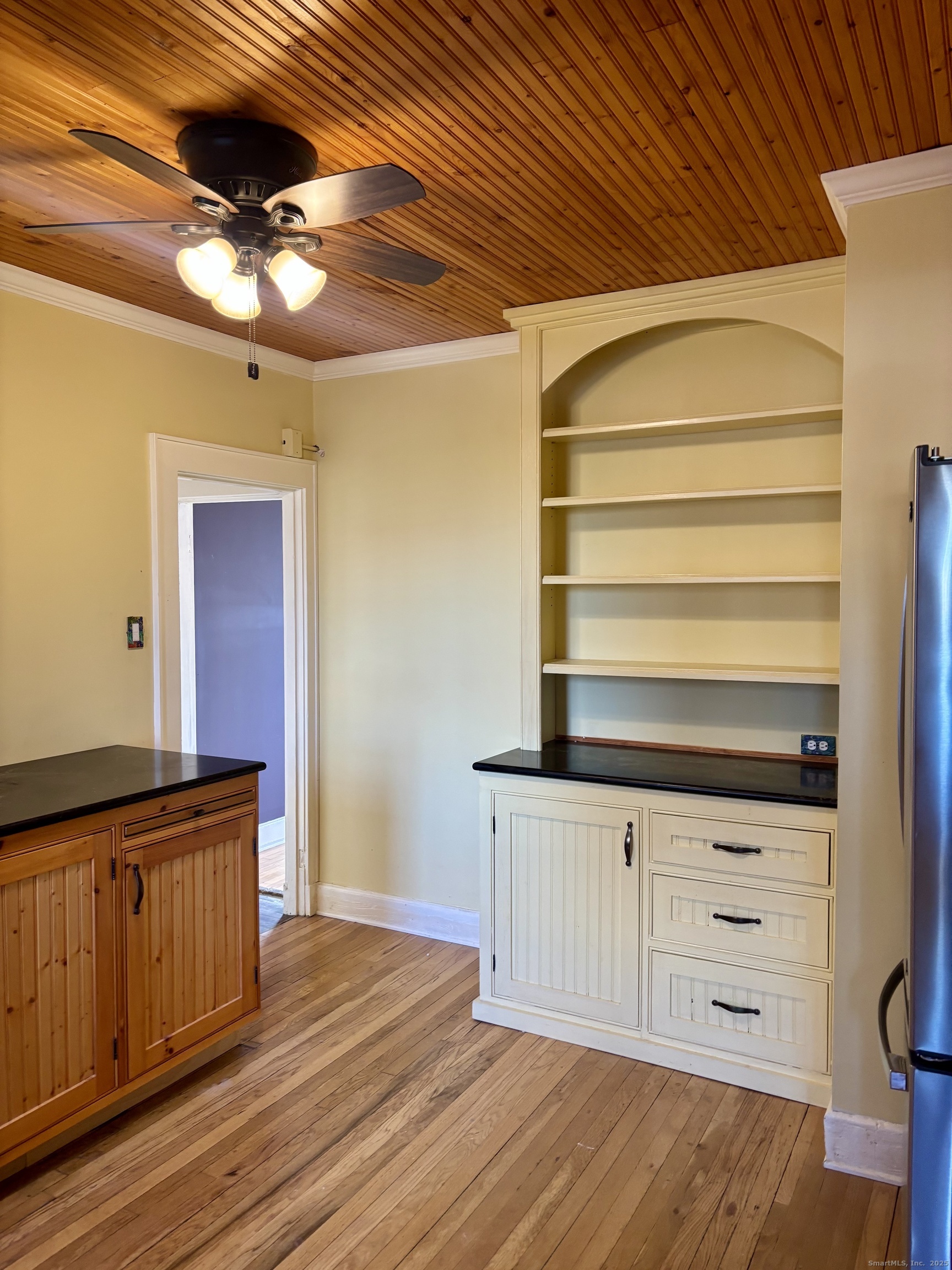 554 Brewster Street, Unit 4 Bridgeport, CT 06605 - Photo 17 of 24 a kitchen with a wooden floor