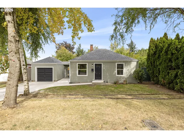 a backyard of a house with lots of green space