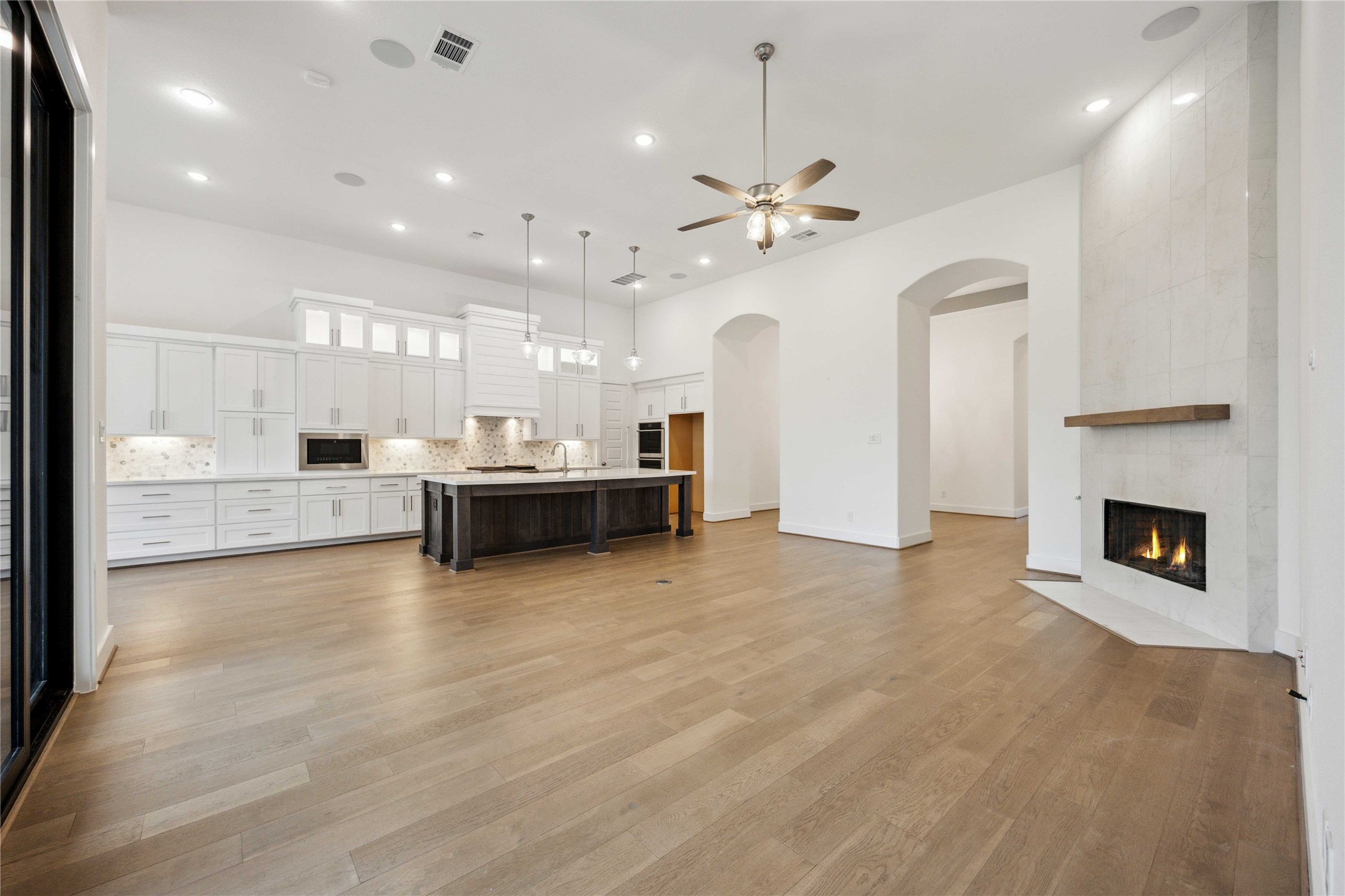 2711 Merlin Way Katy, TX 77493 - Photo 26 of 50 View of the living room and kitchen