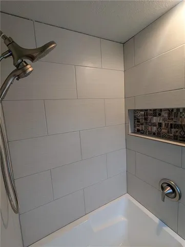 a bathroom with a bathtub