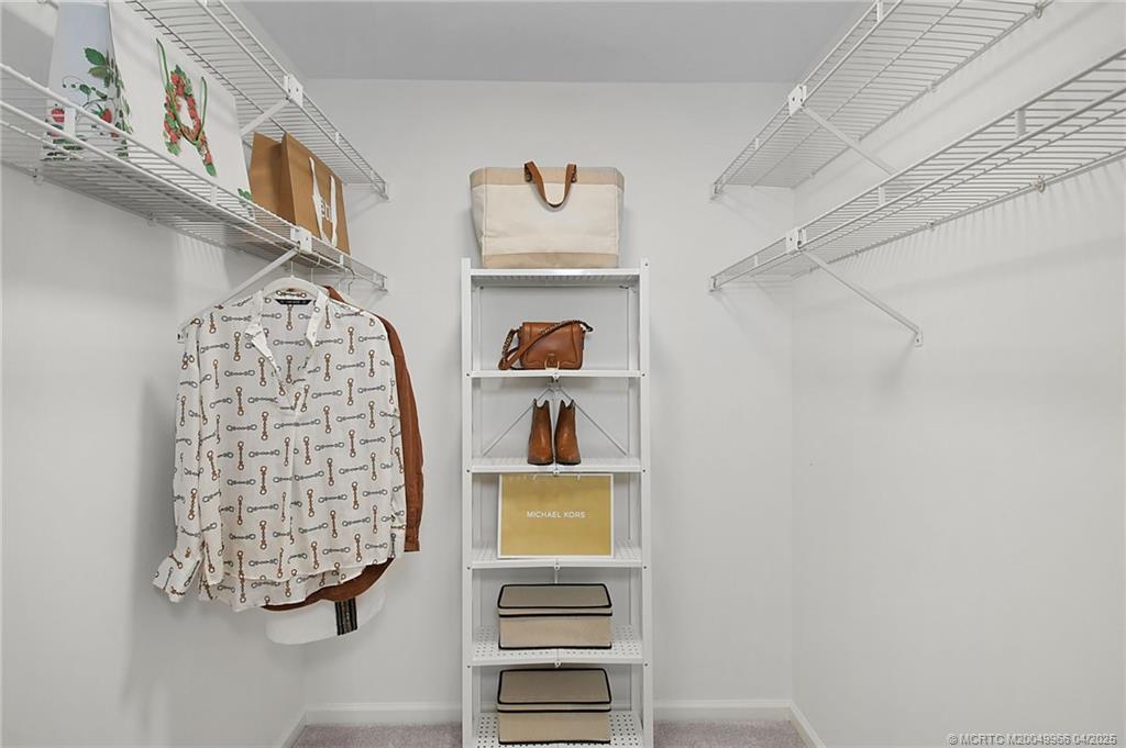 3401 Southeast Martinique Trace, Unit 101 Stuart, FL 34997 - Photo 35 of 51 a view of an entryway with workspace