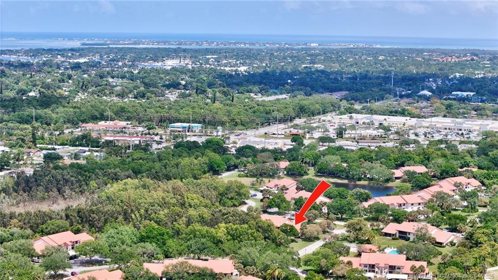 3401 Southeast Martinique Trace, Unit 101 Stuart, FL 34997 - Photo 45 of 51 an aerial view of multiple house